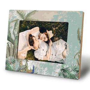 lot 12304 image: WHCHJ Green Tropical Jungle Peacock 5x7 Picture Frame