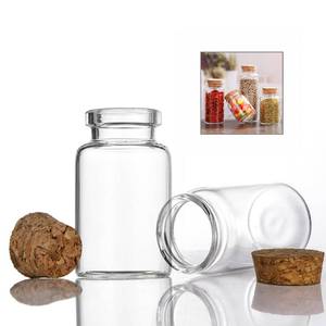 lot 8439 image: ICSTM Glass Bottles with Cork, 2 Pack 3.3 oz Clear