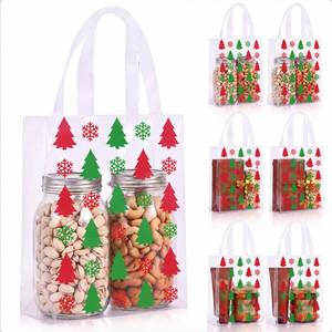 lot 18852 image: Pajean Christmas Plastic Gift Bags with Handles, 25-Pack