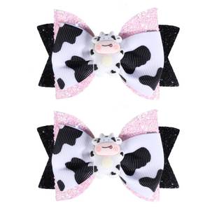lot 12399 image: Miroksh Cow Print Hair Bow Clips, 3 inch, 2-Pack