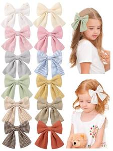 lot 2860 image: Jollybows 12-Piece Baby Girls Hair Clips Fable Bows