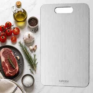 lot 2872 image: Sufkodu Titanium Cutting Board, 12.1 x 7.1 Reversible