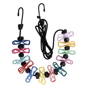 lot 2891 image: Karebeen Retractable Clothesline with Clips and Pins