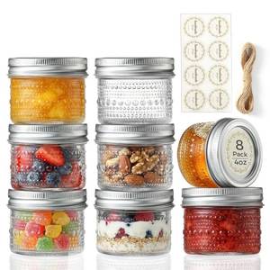 lot 9759 image: 8 Pack Small Glass Jars with Lids - 4oz Vintage Embossed Mini Mason Jars ,Regular Mouth Mason Canning Jar with Seal Bands for Jam, Honey, Jelly, Dessert, Spice, Wedding Favors, DIY Candles Decor