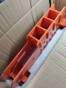 lot 13258 image: Orange Fabricated Steel Bracket Assembly w Slotted Side Plates Ball Hitch For Skid Steer