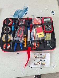 lot 1047 image: Plusivo Electrical Tool Kit with Digital Multimeter, Soldering Iron, Tape and Accessories