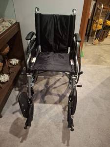 lot 1189 image: Manual Wheelchair with Footrest and Armrests