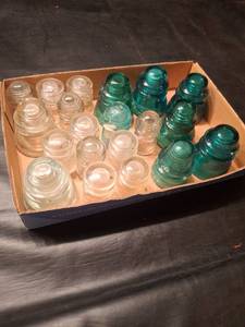 lot 1209 image: Lot of Glass Insulators - Clear and Green