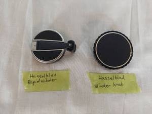 lot 1290 image: Hasselblad Rapid Winder and Winder Knob Camera Accessories (2-Piece Lot)