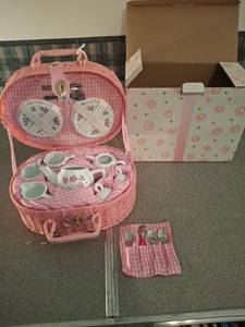 lot 1405 image: Pink Wicker Picnic Basket Tea Set with Plates Cups Teapot and Utensils