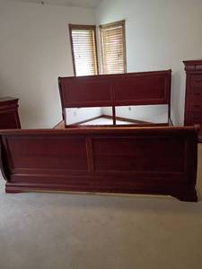 lot 901 image: King Sized Sleigh Bed Frame.  No mattress.  Footboard needs touched up.   Headboard 45.5 x 81.  Footboard 31 x 81.  Matches lots 902 and 903
