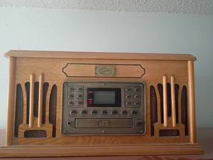 lot 912 image: Spirit of St. Louis Radio CD Player Cassette Player and Record Player.  9 x 18 x 14.  Located in basement