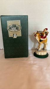 lot 1016 image: David Frykman Portfolio Christmas Collection Santa on Camel Figurine(Piece broken off, but can be repaired)