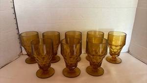 lot 1044 image: Set of 8 Amber Glass Footed Tumblers with Textured Pattern