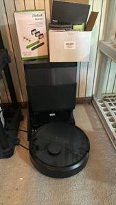 lot 1051 image: iRobot Roomba Robot Vacuum Cleaner with Replacement Kit