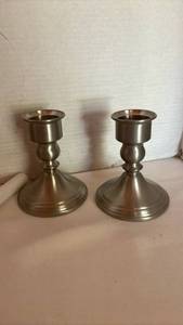 lot 1053 image: Two sets of Candlesticks - one gold and one silver