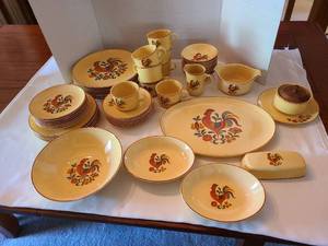 lot 1066 image: Rooster dishes by Taylor Smith and Taylor, total of 58 pieces, no base to butter dish. Serving bowl and two other pieces have chips. Bring packing.