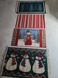 lot 2012 image: Four Christmas rugs, 38x23