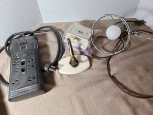 lot 2025 image: Belkin Surge Protector Power Strip 8-Outlet, ceramic  clothes hook and outlet covers, clamp light