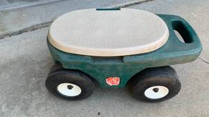 lot 3007 image: Step2 Ride-garden seat with Storage Compartment