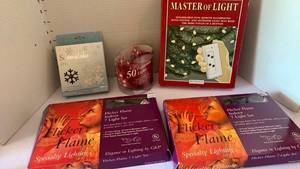 lot 3107 image: Flicker flame and master of light Christmas decor and lights