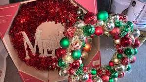 lot 3404 image: Decorated Christmas Wreath with Red Tinsel and Ornaments 24 inch