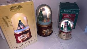 lot 3531 image: Gold Label Holiday Time Snow Globe Musical with Clock and Reed & Barton Snowman Snow Globe Musical