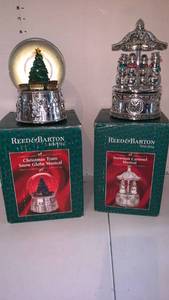 lot 3532 image: Reed & Barton Christmas Train Snow Globe Musical and Snowman Carousel Musical Lot of 2