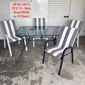 lot 1 image: New Patio Dining Set 38W x 60L Table 27.5H with 4 Striped Chairs