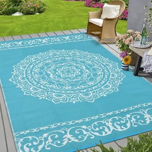 lot 93 image: New Reversible Medallion Outdoor Rug - 9x12 - Light Blue & White