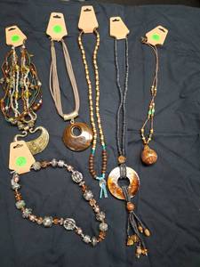 lot 4 image: Beaded Necklaces with Pendants.