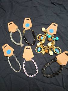 lot 24 image: 6 Fashion Bracelets