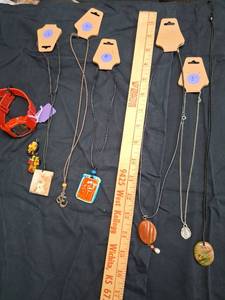 lot 36 image: Casio Digital Watch Red Band with Pendant Necklaces Lot.