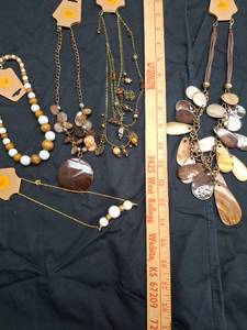 lot 41 image: Lot of 5 Beaded Necklaces with Gold-Tone Chains.