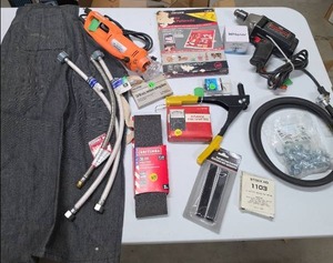 lot 676 image: Tools and hardware - craftsman drill, Chicago rotary tool, jigsaw pattern kit, shop apron, and lots of hardware