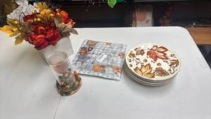 lot 205 image: Fall Harvest Tableware Set Plates,  Napkins, Glass  Decorative Scarecrow Candle Holder