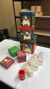 lot 227 image: Holiday Nesting Boxes 3-Piece Snowman Set, small gift boxes and Small Reindeer name themed battery operated candles