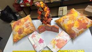 lot 243 image: Fall Autumn Decorative Accents - two Fall Leaf pattern pillows, kitchen towels, Wood Sign and Pumpkin themed centerpiece