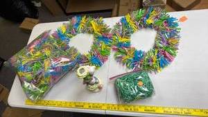 lot 244 image: Colorful Tinsel Garland Wreaths Lot with Ceramic Figurine and Shredded Grass Filler