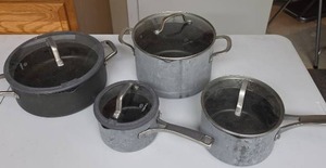 lot 807 image: Calphalon Cookware - 4 pans with lids (3 of the pans the outer finish is worn down, but insides are good condition)