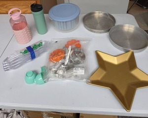 lot 825 image: Round cake pans, star shaped plate, measuring spoons, plastic corn cob holders, cookie cutters, food storage and drink bottles