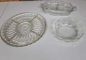 lot 831 image: Glass Serving Dishes - round divided serving tray, divided rectangular serving bowl with handles, and small round bowl