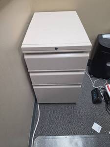 lot 300 image: CreamLight tan 3-Drawer Metal Filing Cabinet (no key). contents not included (will update photos once we have it cleaned out this week). 15 W x 22 78 D x 26 12 H