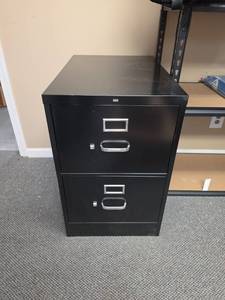 lot 301 image: Hon 2-Drawer Filing Cabinet Black LEGAL Size - 18 18 W x 26.5 D x 29 H - does not have file hanging rack in it, would need to add one to hang folders