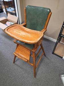 lot 304 image: Vintage MCM Wood High Chair - needs reupholstered and one support repaired (missing support is attached to leg of chair with furniture wrap) 18 W x 22 D x 39 H