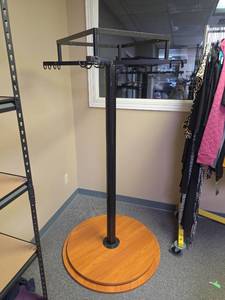 lot 309 image: Rotating Display Rack - great for clothing, scarves, purses.  Rotates quietly and easily.   37 Diameter  x 66 H.  Comes apart for easier transport with just a few hex screws