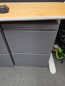 lot 313 image: 2-Drawer Lateral legal size File Cabinet Gray with Wood Top. Folders can hang on side rails. Contents not included.  18 W x 22D x 25 38H