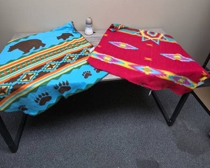 lot 341 image: 2 Native American Decorative Accent Blankets and a Clay Decorative Bell