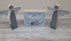 lot 357 image: Decorative Angel Figurines and Sign Set What Is Done in Love Is Done Well.