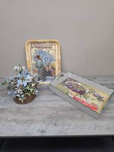 lot 390 image: F.lli Marchand Automobili Velocipedi Piacenza Advertising Tray (thick cardboard), Fruit themed wood tray, and copper tea pot with floral arrangment.   Orange